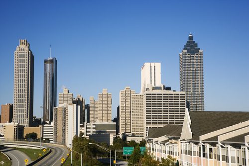 A view of the city skyline from across the street.