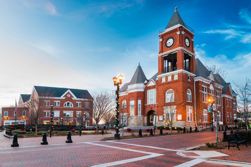 A large brick building with a clock tower.