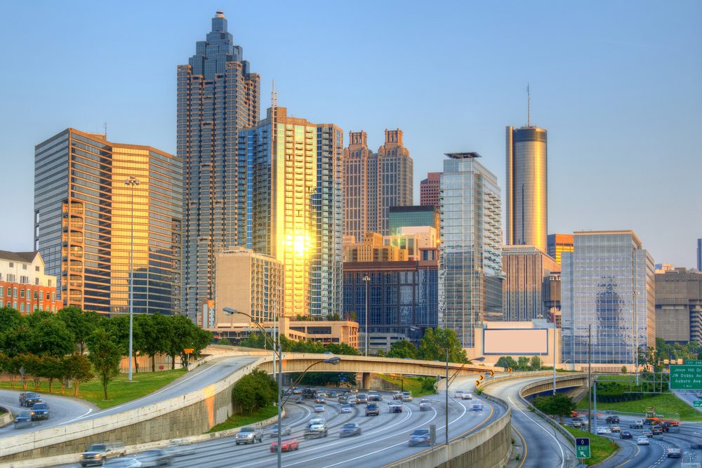 A view of the city skyline from across the street.